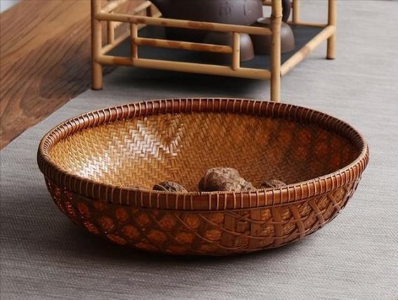 中国簸箕风靡国际：手工艺术品的背后